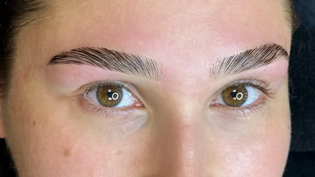 Brow Lamination result: soft, natural brushed-up brows